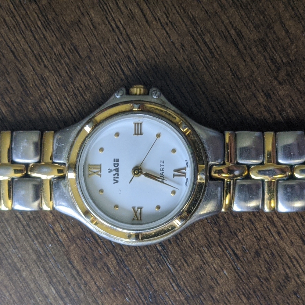 Visage silver and gold watch with silver and gold bands